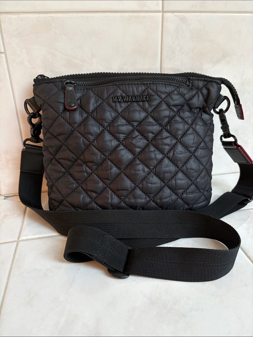 MZ Wallace Black Quilted Small Crossbody with Subtle Red Trim